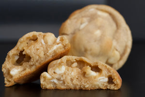White Chocolate Chip Macadamia Cookie Broken apart by bake the cookie shoppe in Las Vegas