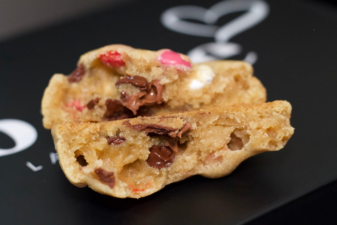The Chocolate Chip m&m Cookie from bake the Cookie Shoppe in Las Vegas broken open