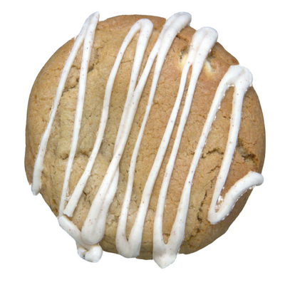 Cookie with pumpkin spice frosting drizzled