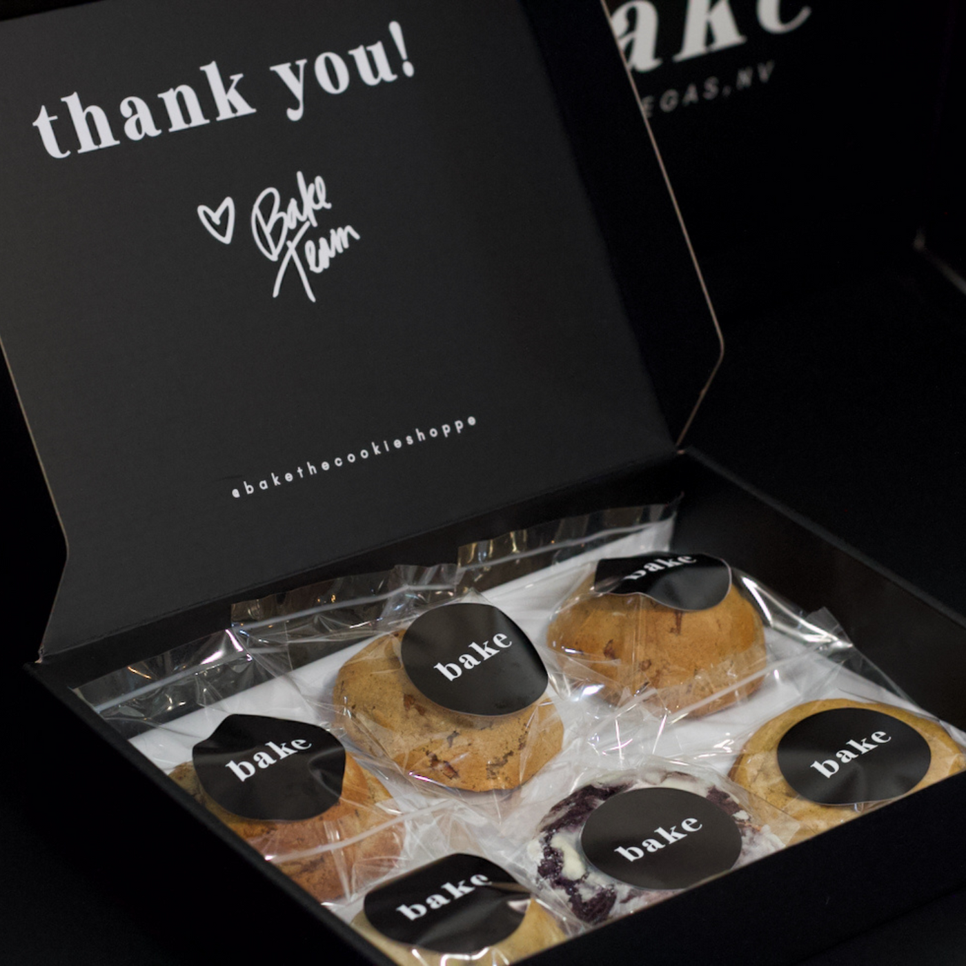 Box of 6 Cookies inside the black bake the cookie shoppe box with the Thank you message from bake.