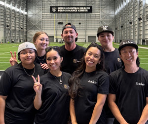 the bake team on the field at the Raiders Field, Chad Indrieri and Trung Nguyen partners at bake the Cookie Shoppe in Las Vegas