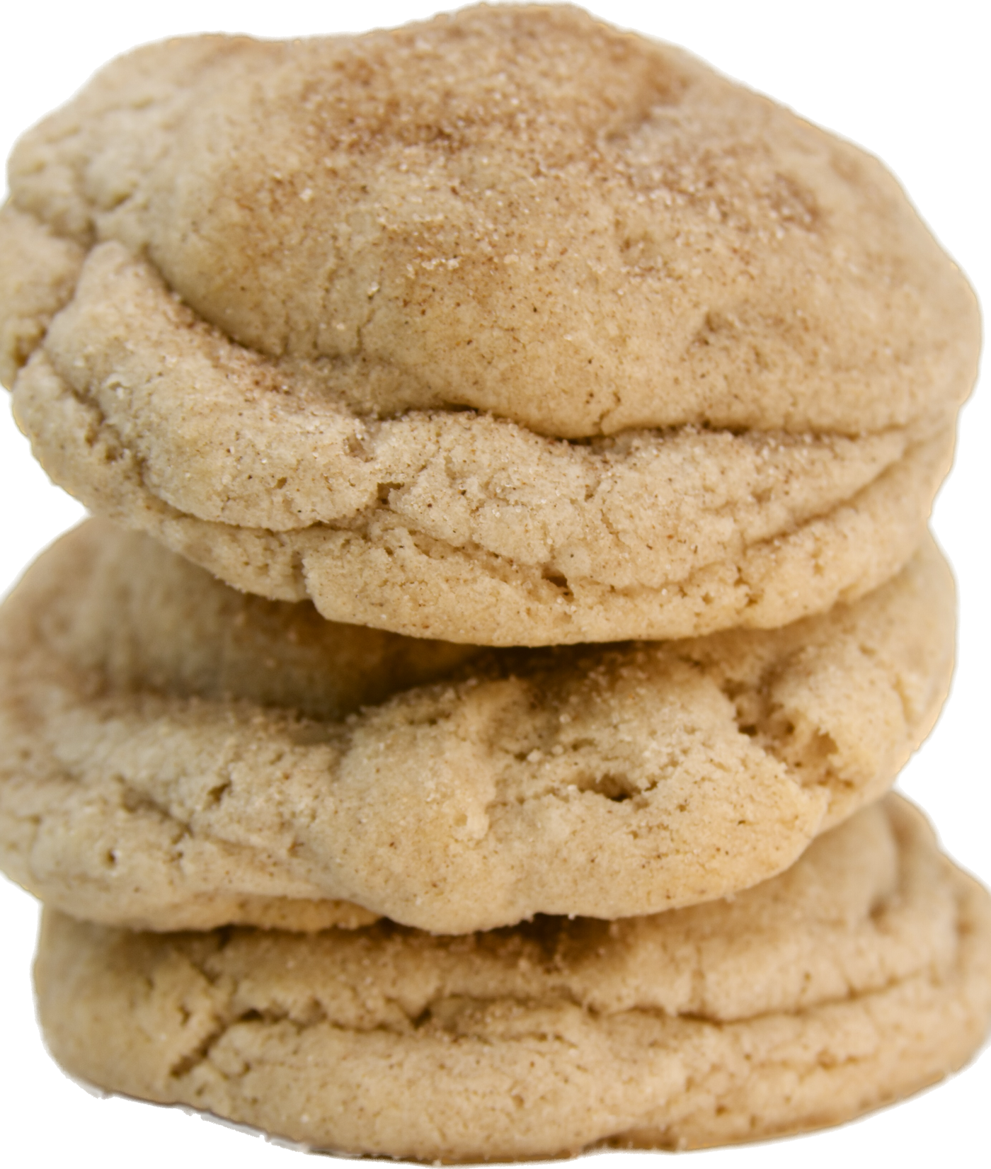 A stack of three soft and chewy snickerdoodle cookies with a generous dusting of cinnamon sugar on top