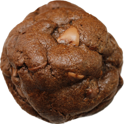 A triple chocolate cookie with chunks of dark, milk, and white chocolate scattered throughout the dough and melting on top. The cookie is slightly crispy on the edges and soft in the center, with a rich chocolate flavor that is sure to satisfy any chocolate lover's cravings.