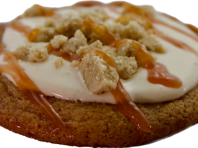 Freshly baked guava crumble cookies with a generous dollop of cream cheese frosting
